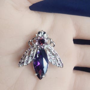 Sparkling zircon bug brooch&#39;s a whimsical collection.