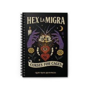 May include: Black spiral-bound notebook with the text "HEX LA MIGRA" at the top. The cover features a mystical design with purple hands, a heart with an eye, and the words "CURSES FOR CAGES". The bottom reads "QUIET RAGE, LOUD PAGES."