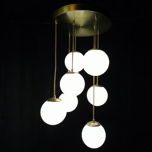 Modern 7-Light Glass Globe Chandelier with Gold Accents