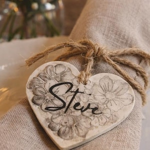 Personalised Botanical Wedding Place Settings. Floral Wedding Favours with Names. Rustic Barn Vibe Weddings double as Wedding Favours.