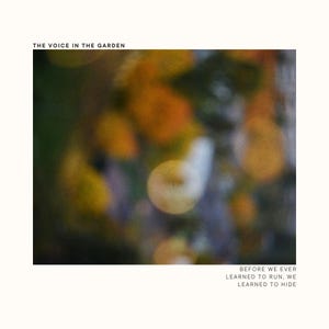 Op de afbeelding: Albumhoes met een vage achtergrond van oranje en groene tinten. De tekst "THE VOICE IN THE GARDEN" staat bovenaan. Daaronder staat de tekst "BEFORE WE EVER LEARNED TO RUN, WE LEARNED TO HIDE."