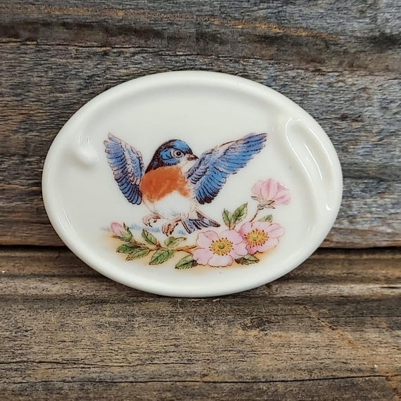 Vintage Boehm porcelain bluebird and wild roses brooch