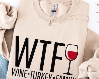 WTF Thanksgiving Sweatshirt – WTF Wine Turkey Family Shirt, Cozy Fall Holiday Sweater, Humorous Turkey Day Gift for Wine Lovers