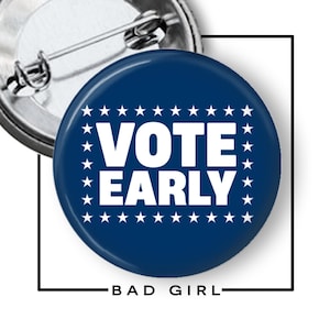 May include: A circular pin-back button with a dark blue background. The text VOTE EARLY is printed in bold white capital letters in the center, surrounded by a rectangular border of small white stars. The metal pin mechanism is visible on the back.