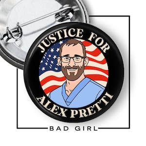 May include: A black button with the text "JUSTICE FOR ALEX PRETTI" in white, surrounding a portrait of a man with glasses and a beard, set against an American flag background. The words "BAD GIRL" are at the bottom.