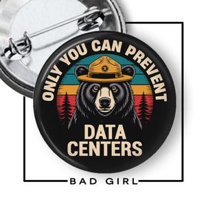 May include: A circular pin-back button featuring a black bear wearing a tan ranger hat. The background shows a sunset with horizontal stripes in teal, orange, and red, and black pine trees. The text reads: ONLY YOU CAN PREVENT DATA CENTERS.