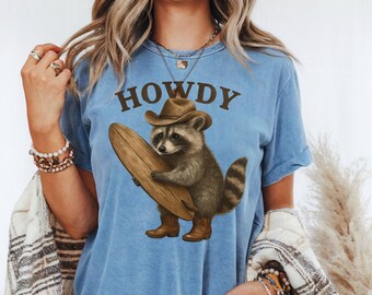 Funny Racoon Rodeo Shirt, Wild Cowboy Tee With Sarcastic Animal Humor, Perfect Gift Idea For Rodeo Fans And Country Western Lovers