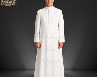 May include: A floor-length white cassock featuring a standing collar and a central vertical row of small matching buttons extending from the neckline to the hem. The garment has long sleeves and a structured, tailored fit with a clean, solid finish.