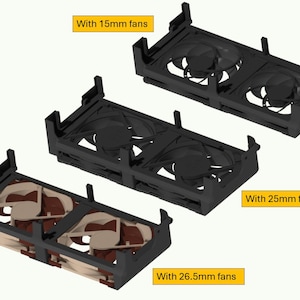 May include: Three black rectangular fan mounting brackets, each holding two circular cooling fans. The top bracket features 15mm fans, the middle bracket features 25mm fans, and the bottom bracket features 26.5mm fans with tan and brown blades.