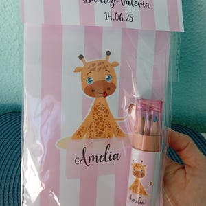 libreta infantil con pinturas y sacapunta