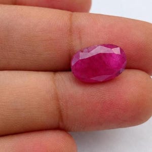 9.96 Ct Natural Unheated Ruby , Purplish Red Oval Mixed Cut, GGI Certified Gemstone