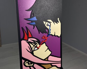 May include: A framed illustration of two anime characters, a woman with pink hair and a man with black hair, looking at each other. The woman has red tears and the man has blue tears. The background is purple.