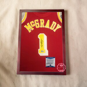 Koszulka koszykarska McGrady nr 1 z autografem Houston Rockets w kolorze czerwonym – nowość – oprawiona / bez ramki – naklejka Beckett, kod QR (przeczytaj opis)