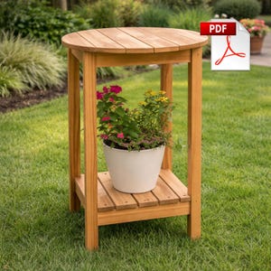 May include: A round wooden plant stand with a lower shelf. The stand holds a white pot filled with colorful flowers. The stand is made of light brown wood and is set on a grassy lawn.