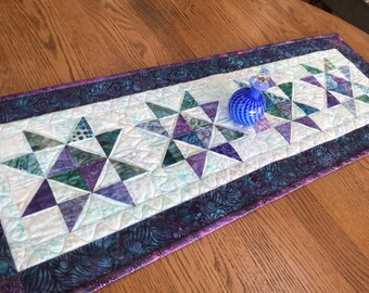 Twilight Stars 14x41 quilted table runner in jewel colors