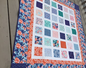 Simply VOYAGE 54x60 quilt in bold orange and blue by Kate Spain