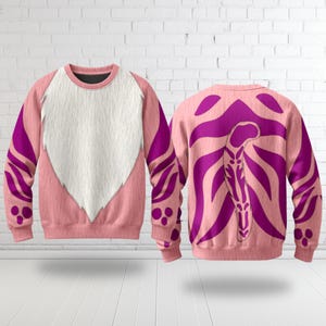 May include: A long-sleeve crewneck sweatshirt featuring a pink base with a large white fur-like chest patch on the front. The back displays a vibrant purple tiger-stripe pattern with a central tail graphic and matching purple accents on the sleeves.