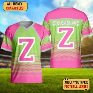 May include: A pink and green football jersey with the letter "Z" on the front and back. The jersey has the word "SEABROOK" on the back. The text "ALL DISNEY CHARACTERS" and "ADULT/YOUTH/KID FOOTBALL JERSEY" are also visible.