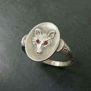 Adorable Sterling Silver Fox ring with genuine ruby eyes.