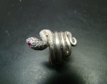 Elegant Sterling silver snake ring with genuine diamonds and rubies