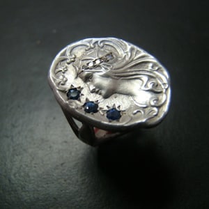 Beautifully Sculpted Sterling Silver Art Nouveau style ring with diamonds and sapphires