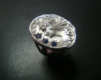 Beautifully Sculpted Sterling Silver Art Nouveau style ring with diamonds and sapphires