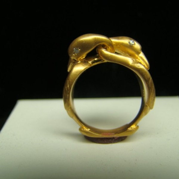 Romantic 14k Gold double swan ring with diamonds