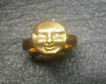 Unique and Beautifully detailed 14K gold moonface ring with genuine diamonds