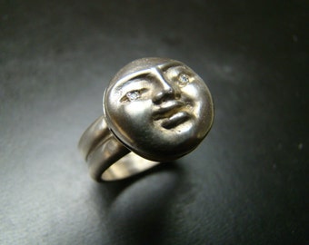 Sterling Silver Moon face ring with genuine diamond eyes