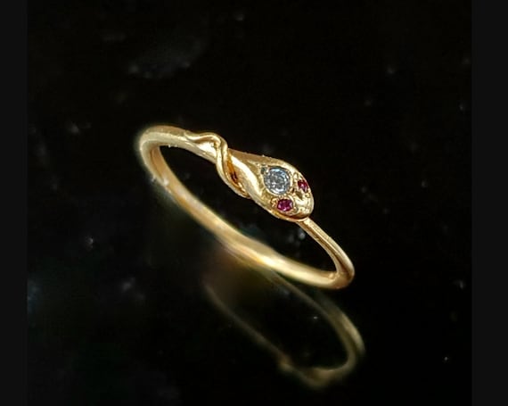 Very sweet 14K gold snake ring with diamond and ruby eyes