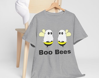 May include: A gray t-shirt with a humorous graphic of two cartoon bees dressed as ghosts. The bees have white bodies, yellow wings, and black and yellow stripes. The text "Boo Bees" is printed below the graphic.
