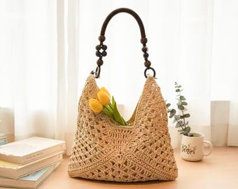 May include: A beige crochet handbag featuring an openwork diamond pattern and a dark brown wooden handle adorned with decorative wooden beads. The bag contains three yellow tulip flowers protruding from the top opening of the woven structure.