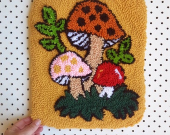 Retro mushroom embroidery. Punch needle wall hanging. 70s style decor. Mustard and orange yarn.