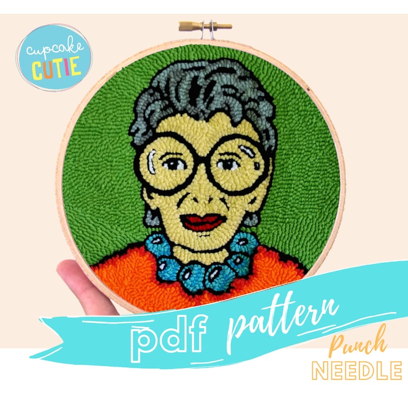 May include: A punch needle pattern featuring a colorful portrait of a woman wearing glasses and a necklace. The pattern is in a round embroidery hoop and the text "pdf pattern Punch NEEDLE" is on a blue ribbon.