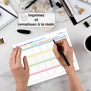 May include: A printable chore chart with a rainbow color scheme. The chart is titled "Tableau des Taches Familiales" and has a section for each day of the week. The text at the top of the chart says "Imprimez et remplissez &agrave; la main".