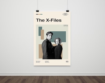 May include: Poster featuring the title "The X-Files" with a retro design. The poster includes images of two people in black and white, with the text "Created by Chris Carter" and the year "93". The poster is hanging on a white wall.