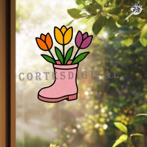 May include: A pink wellington boot illustration with three tulips in orange, yellow, and purple. The boot has a black outline, and the tulips have green stems and leaves. The text "CORTES DIGITAL" is at the bottom of the image.