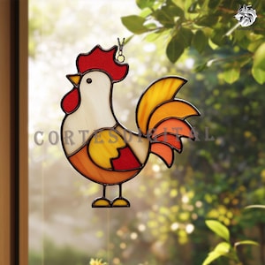 May include: Stained glass rooster suncatcher with a red comb, yellow beak, and a white body. The tail feathers transition from yellow to orange and red. The text "CORTES DIGITAL" is visible on the image. A decorative item for windows.