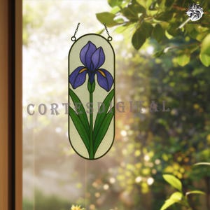 May include: Stained glass panel featuring a stylized iris flower. The flower has purple petals with yellow accents, green leaves, and a light green background. The panel is suspended by a chain.