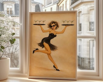 May include: A framed print of a woman in a black dress, sunglasses, and high heels, balancing trays of martini glasses. The artwork has a vintage, pin-up style with a sepia-toned background. The woman is running, adding a sense of movement.