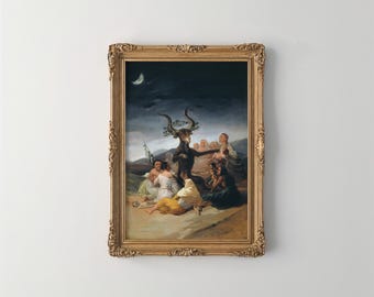 Könnte beinhalten: Ein gerahmter Druck von Francisco Goyas Hexensabbat, der eine zentrale Ziegenfigur zeigt, umgeben von einer Gruppe sitzender Personen in einer dunklen, mondbeschienenen Landschaft. Das Kunstwerk befindet sich in einem verzierten, goldfarbenen Rahmen.