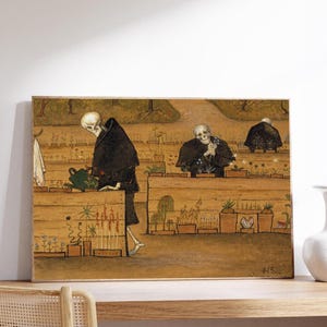 May include: A framed art print depicting skeletons tending a garden. The skeletons wear black robes and are shown watering plants in wooden planters. The artwork has a vintage, illustrative style with a muted color palette.