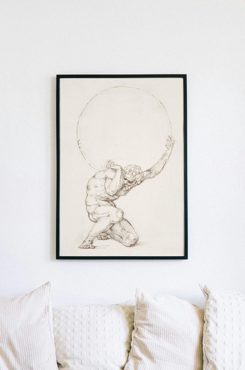 Puede incluir: Impresi&oacute;n enmarcada en negro de un dibujo cl&aacute;sico que representa a Atlas arrodillado sosteniendo una gran esfera. La obra de arte es un boceto detallado con sombreado, que muestra la forma muscular de la figura y el contorno de la esfera. La impresi&oacute;n est&aacute; montada en una pared blanca.