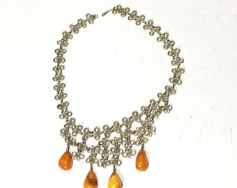 Vintage silver toned scrolled bib necklace with Baltic amber chunks