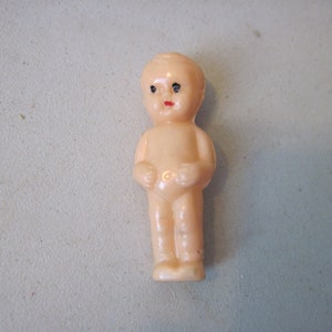 small vintage plastic frozen charlotte Doll