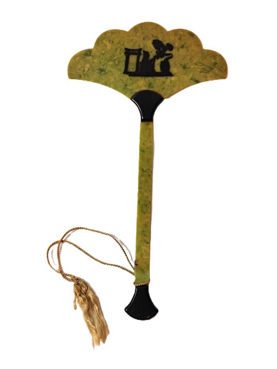 Antique green marbled celluloid hand fan