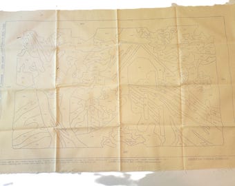 May include: A beige canvas with a black and white line drawing of a house and trees. The canvas is folded in the middle and has a few creases. The text "DMC" is printed in the bottom right corner.