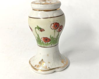 Antique porcelain poppies hat pin holder
