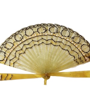 Antique yellow celluloid folding fan