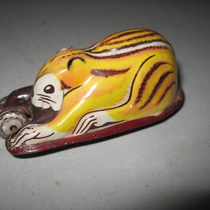 vintage tin litho friction toy Chimpmunk with ball
